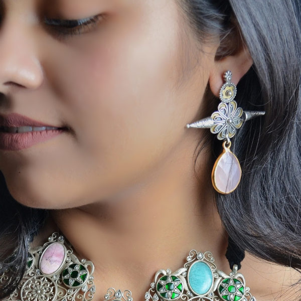 Flowery silver dangler with water drop stone